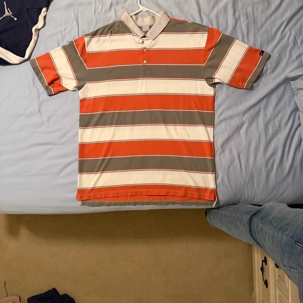 $20 Like new Nike Men's Polo Shirt in an XL- Orange , Gray, White Stripes.